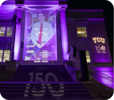 TCU 150 banner featuring Harris College dean Watts